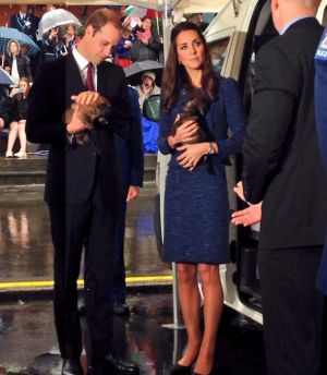 Kate Middleton wearing a blue Sparkle Tweed two-piece blazer and skirt by New Zealand designer Rebecca Taylor.jpg